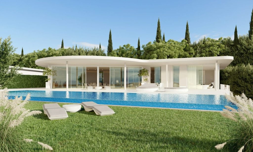 ViVi Real Estate: A modern luxury villa in Benalmádena, offering breathtaking sea views. The villa boasts a beautiful swimming pool and comfortable lounge chairs for ultimate relaxation.