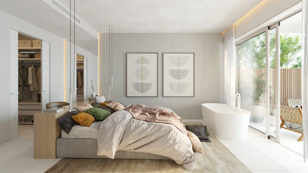 ViVi Real Estate: A luxurious bedroom in a development with a large bed and a bathtub.