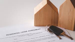 ViVi Real Estate: A residential lease agreement with keys on top of a piece of paper, emphasizing the importance of understanding Malaga rental laws.